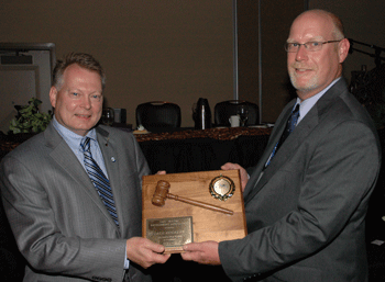 Kocarek passes gavel to Clark